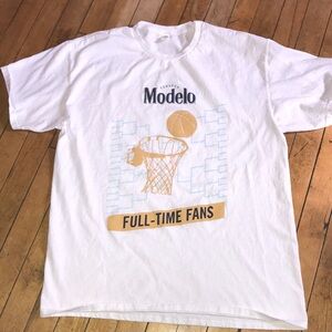 ModelCo White T-Shirt with Gold Basketball Graphic and Blue Bracket Accents